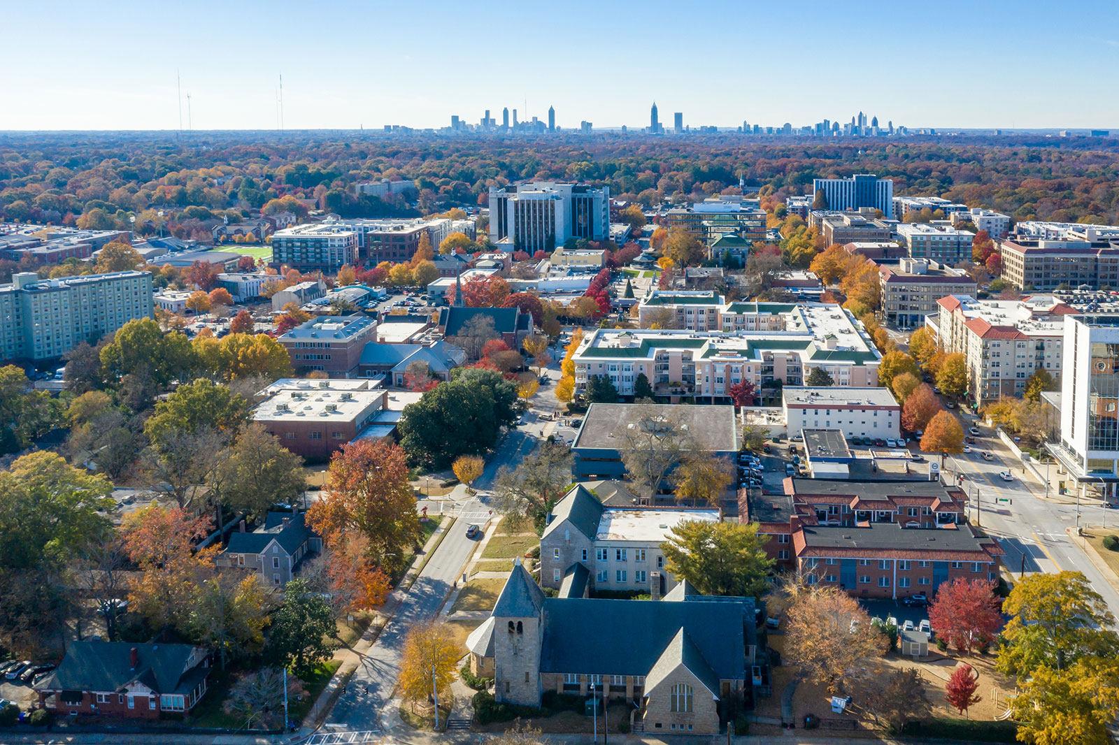 Aerial shot of Decatur, Georgia, location of the Williams Teusink real estate law firm, with Atlanta in the background.